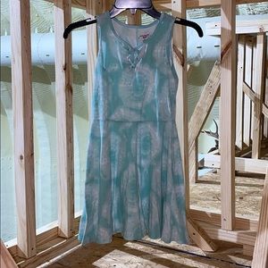 His is a really cool tie-dye dress!